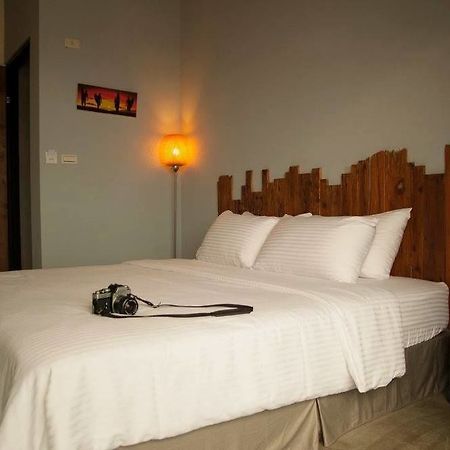 Lugo Hotel Manzhou Bagian luar foto
