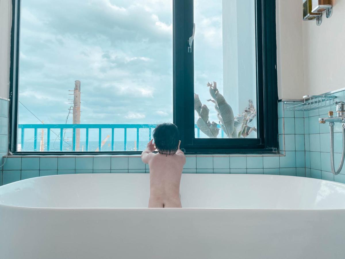 Lugo Hotel Manzhou Bagian luar foto