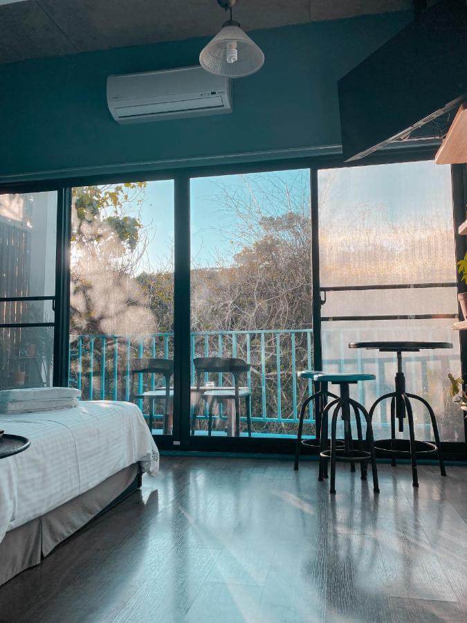 Lugo Hotel Manzhou Bagian luar foto
