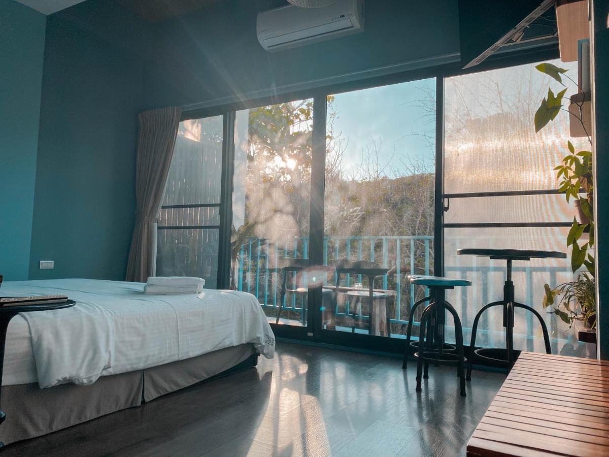 Lugo Hotel Manzhou Bagian luar foto