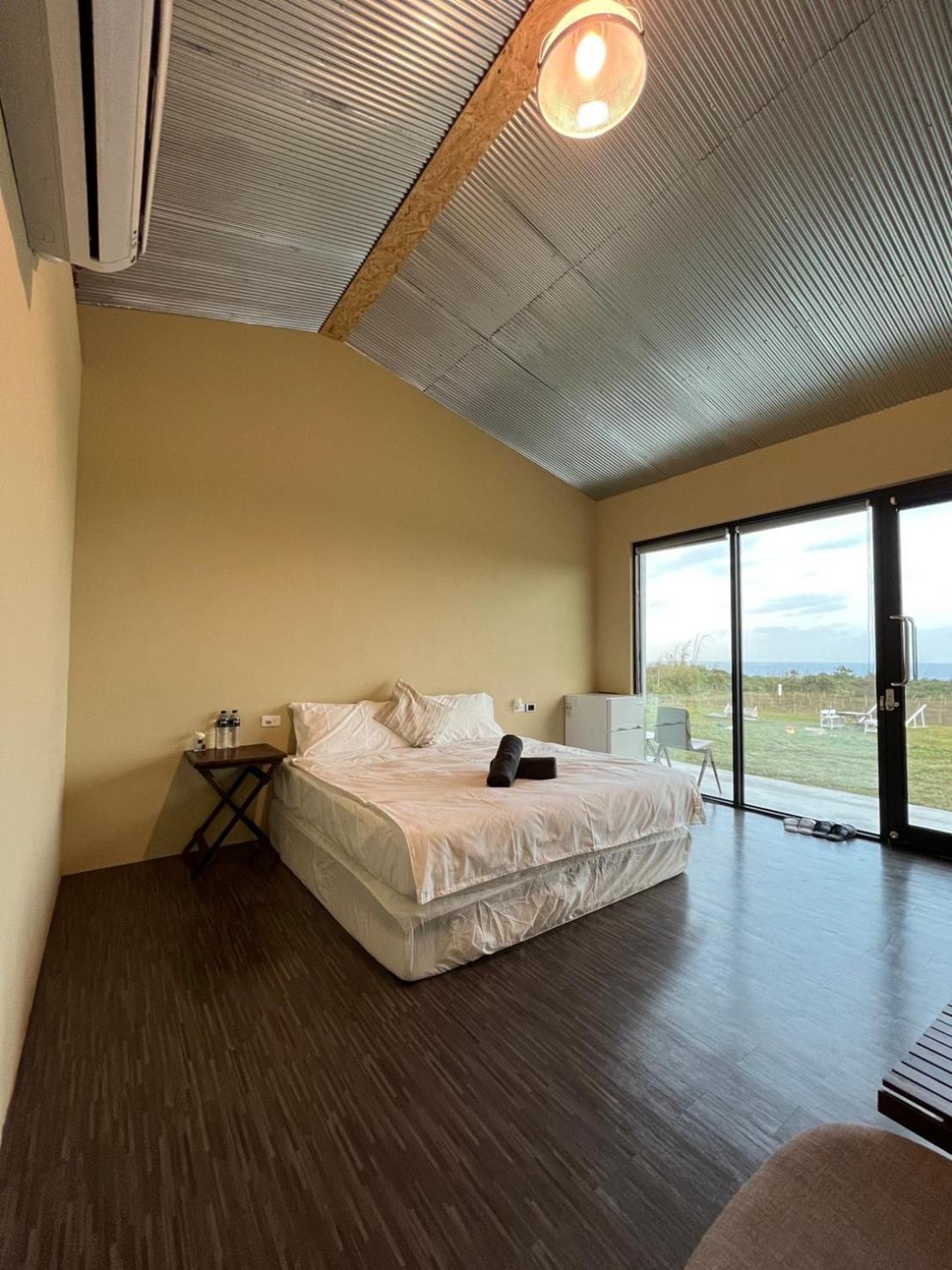 Lugo Hotel Manzhou Bagian luar foto