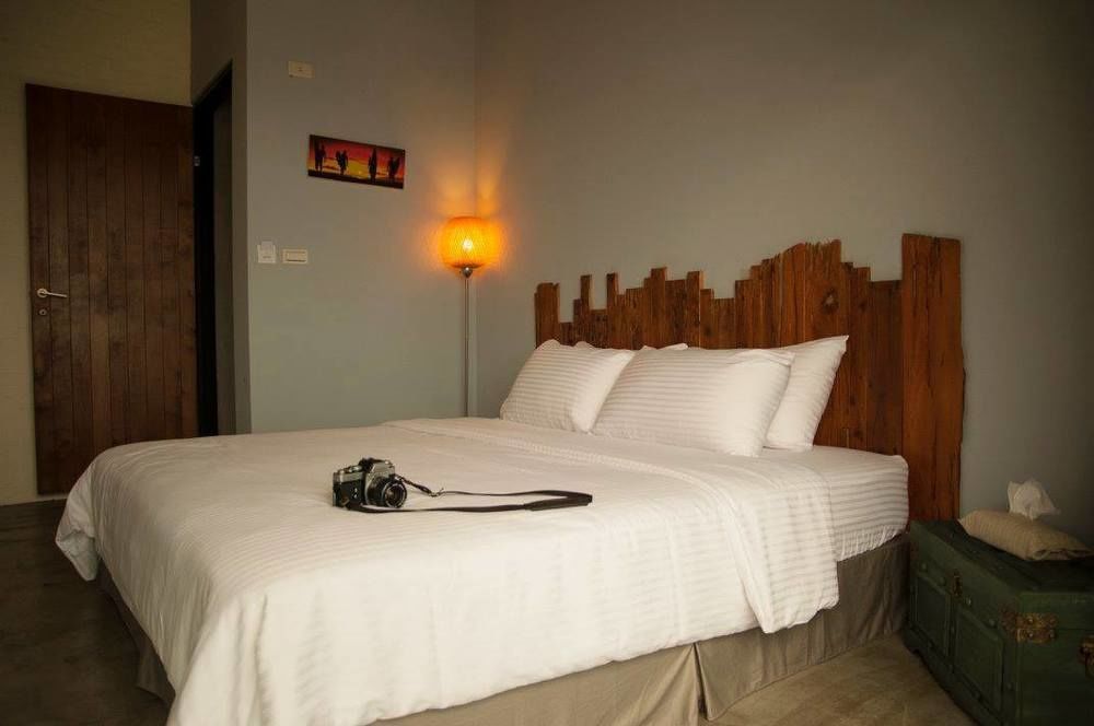 Lugo Hotel Manzhou Bagian luar foto