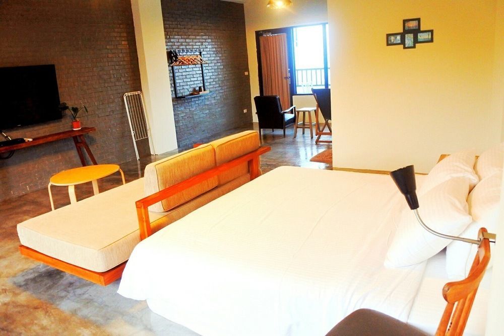 Lugo Hotel Manzhou Bagian luar foto